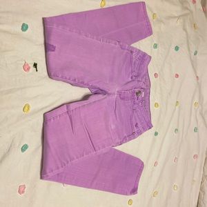 PINK JUSTICE JEANS WITH RIP ON THE RIGHT LEG